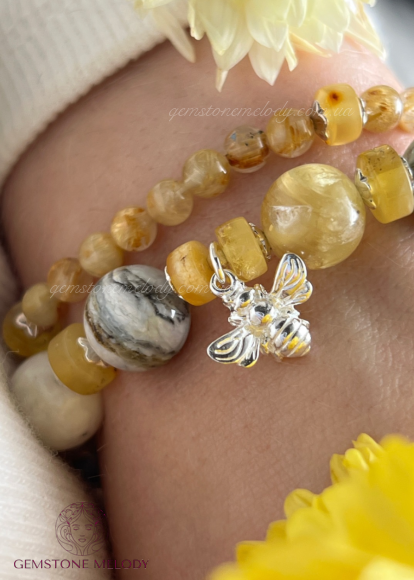 Набір браслетів з каменів жовтих, теплих кольорів Набір браслетів з каменів жовтих, теплих кольорів